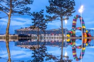 a cruise ship in a body of water with a large at LA TERRASSE DE NOTRE DAME in Le Havre +33 photos