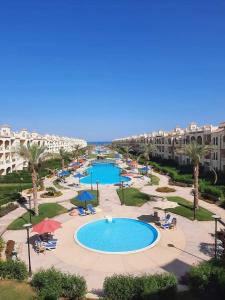 a view of the pool at the resort at LASIRENA PALM BEACH RESORT -FAMILY in Ain Sokhna