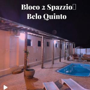 a resort with a swimming pool and a building at Brotas Suítes Belo Quinto & Spazzio Bloco 2 in Brotas