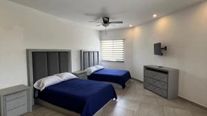 Ένα ή περισσότερα κρεβάτια σε δωμάτιο στο Hotel Plazuela