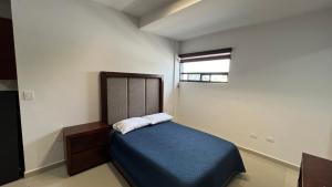 Ένα ή περισσότερα κρεβάτια σε δωμάτιο στο Hotel Plazuela