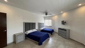 Ένα ή περισσότερα κρεβάτια σε δωμάτιο στο Hotel Plazuela