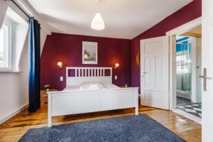 Postel nebo postele na pokoji v ubytování Old Town Center Apartments