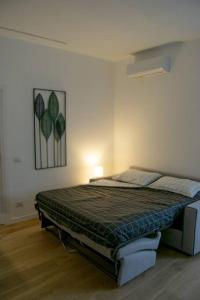 Postel nebo postele na pokoji v ubytování Casa Prospettiva Verde, tra natura e città