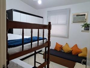 Ένα ή περισσότερα κρεβάτια σε δωμάτιο στο Casa familiar condomínio fechado