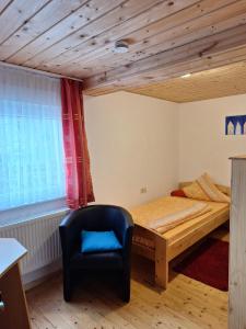Postel nebo postele na pokoji v ubytování Gästehaus Rüger
