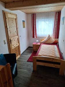 Postel nebo postele na pokoji v ubytování Gästehaus Rüger