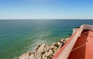a view of the ocean from the edge of a cliff at Stunning Apartment In Peñíscola in Peñíscola