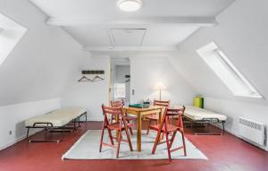 a dining room with a table and chairs at 2 Bedroom Beautiful Home In rskbing in Ærøskøbing