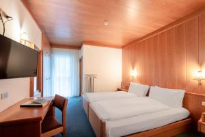 Postel nebo postele na pokoji v ubytování Hotel Grohmann