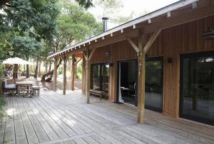 En terrasse eller udendørsområde på Belle Villa Pointe du Ferret - R170