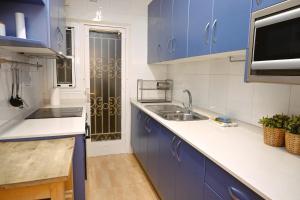 Η κουζίνα ή μικρή κουζίνα στο Homenfun Barcelona Eixample ll