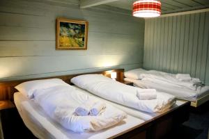 Postel nebo postele na pokoji v ubytování Family-friendly chalet apt with balcony