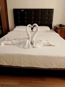 Postel nebo postele na pokoji v ubytování BALŞEN HOTEL