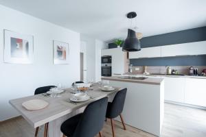 Køkken eller tekøkken på Le cinquième ciel - 75m2 avec garage privé + 5 billeder