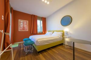 Voodi või voodid majutusasutuse Hotel Paradiso Conca d'Oro toas