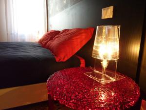 A bed or beds in a room at Casa Corte delle Ancore