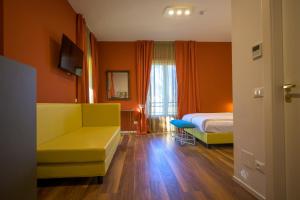 Voodi või voodid majutusasutuse Hotel Paradiso Conca d'Oro toas