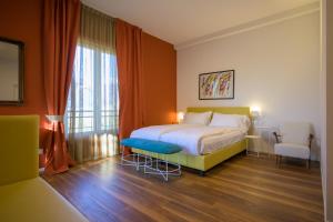 Voodi või voodid majutusasutuse Hotel Paradiso Conca d'Oro toas