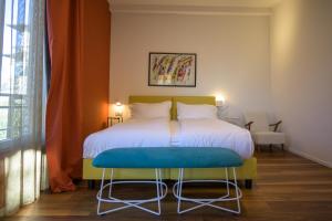 Voodi või voodid majutusasutuse Hotel Paradiso Conca d'Oro toas