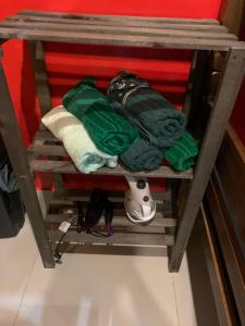 a shelf with towels and other items on it at BRÁS, TEMPLO, Expo Center Norte, Anhembi, 25 in Sao Paulo