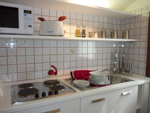 A kitchen or kitchenette at Casa Corte delle Ancore
