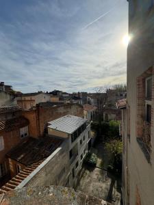 a view of a city from a building at Le bijou des carmes - Haut de gamme climatisé in Toulouse