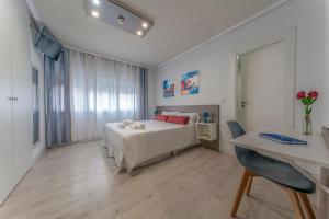 Postel nebo postele na pokoji v ubytování Hotel Gabriel y Galán