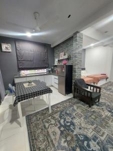 Гостиная зона в Kesuma Homestay Pantai Murni