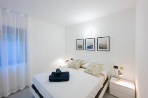 Katil atau katil-katil dalam bilik di Gelsi Apartments Lake Como