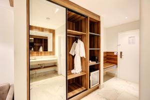 Cama ou camas em um quarto em DoubleTree by Hilton - Resort - Foz do Iguaçu