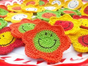 a plate of crocheted crocheted cats on a table at Peekaboo house in Ubon Ratchathani