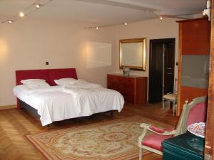 Ліжко або ліжка в номері Holiday Home De Colve