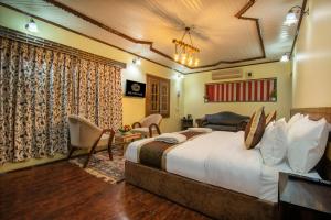 Ένα ή περισσότερα κρεβάτια σε δωμάτιο στο Hotel De-Villaz luxury +42 φωτογραφίες