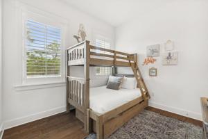 Ένα ή περισσότερα κρεβάτια σε δωμάτιο στο Coastal Cottage at 30A +32 φωτογραφίες