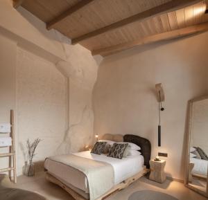 Voodi või voodid majutusasutuse Manili Boutique Suites & Villas toas