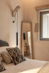 Voodi või voodid majutusasutuse Manili Boutique Suites & Villas toas