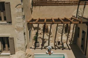 Rõdu või terrass majutusasutuses Manili Boutique Suites & Villas