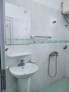 Et badeværelse på HOÀNG VY HOTEL Quan Lạn
