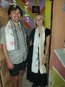 a man and a woman posing for a picture at Krishna Home Stay in Mathura
