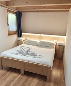 Postel nebo postele na pokoji v ubytování Chalet - Margherita