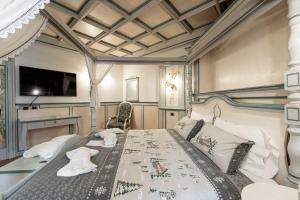 Televízia a/alebo spoločenská miestnosť v ubytovaní Hotel Dolomiti Schloss