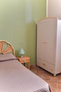 A bed or beds in a room at Villa Chiara