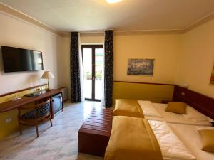 TV/trung tâm giải trí tại Hotel Villa Olivo Resort 3S