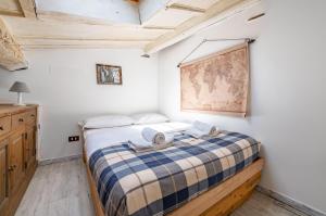 Posteľ alebo postele v izbe v ubytovaní Gioberti Cozy Apartment con Terrazzo