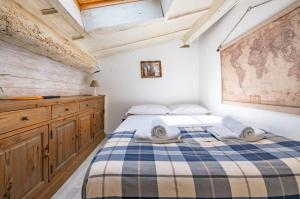 Posteľ alebo postele v izbe v ubytovaní Gioberti Cozy Apartment con Terrazzo