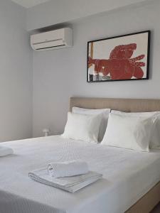 Ένα ή περισσότερα κρεβάτια σε δωμάτιο στο Serene 3BR Hideaway in Naxos!