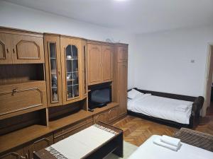 Postel nebo postele na pokoji v ubytování Apartman NINA + 4 fotografie