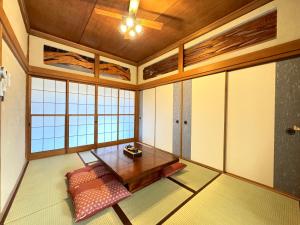Fotografie z fotogalerie ubytování 【海水浴場まで3分！】リノベーションされた古民家を貸切！ANGO KUJUKURI3 v destinaci Kujukuri