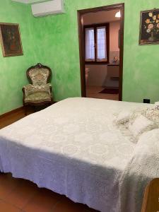 Ένα ή περισσότερα κρεβάτια σε δωμάτιο στο La Cassina Room
